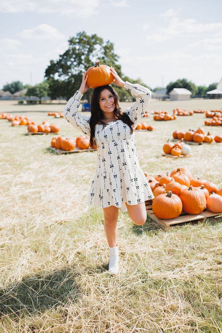 Take A Bow Smocked Dress